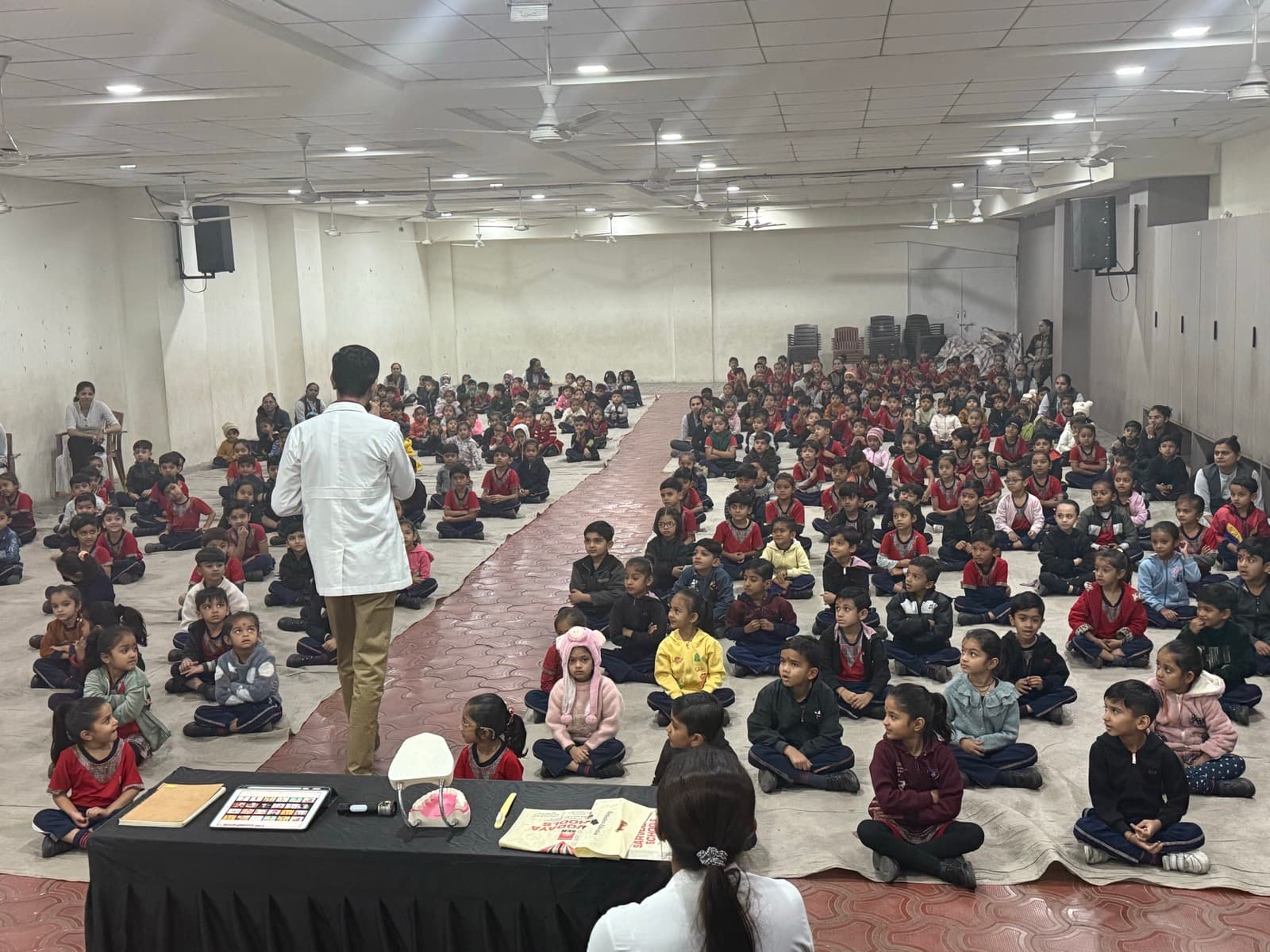 Aarogyam school oral health program with dental model demonstration